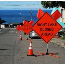Roll Up Traffic Sign In Action